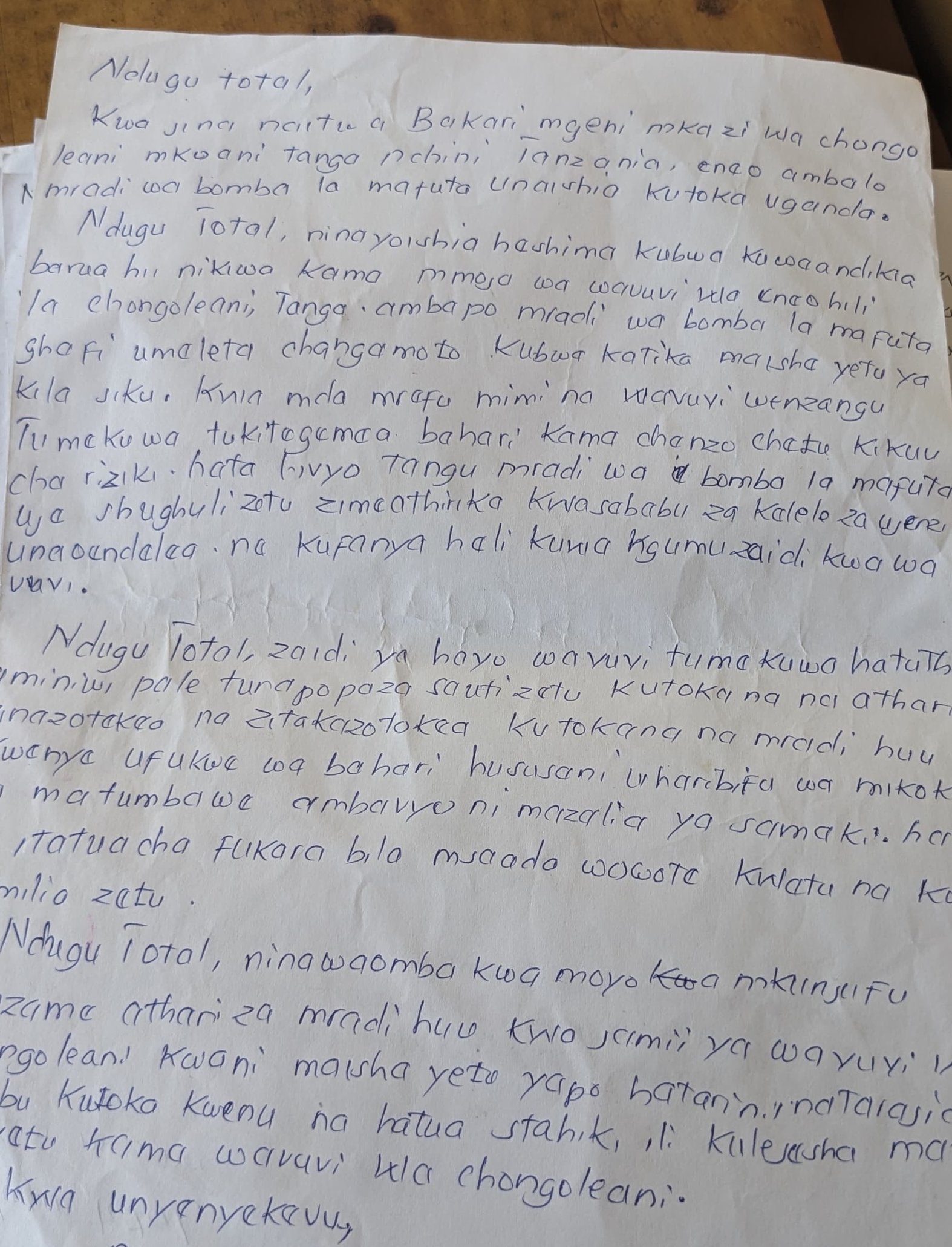 Handwritten letters to Total Energies from Tanzania’s youth. [Credit: Baraka Machumu]