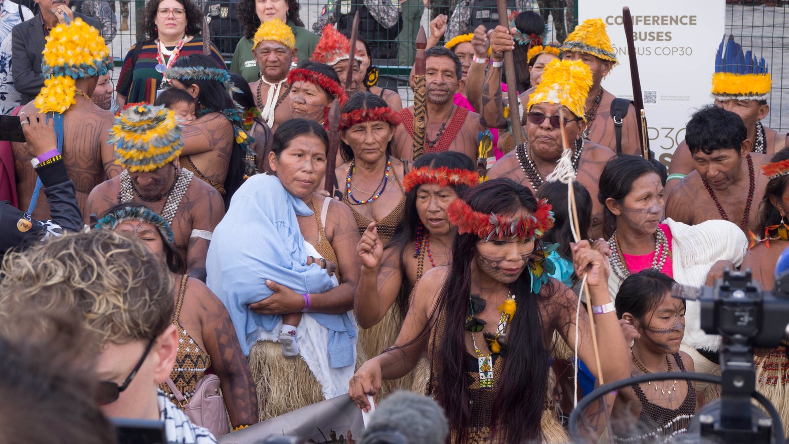 A group from the Munduruku blocked the official entrance to the COP30 pavilion in a non-violent protest on 14 November 2025 (Credit: Royce Kurmelovs)