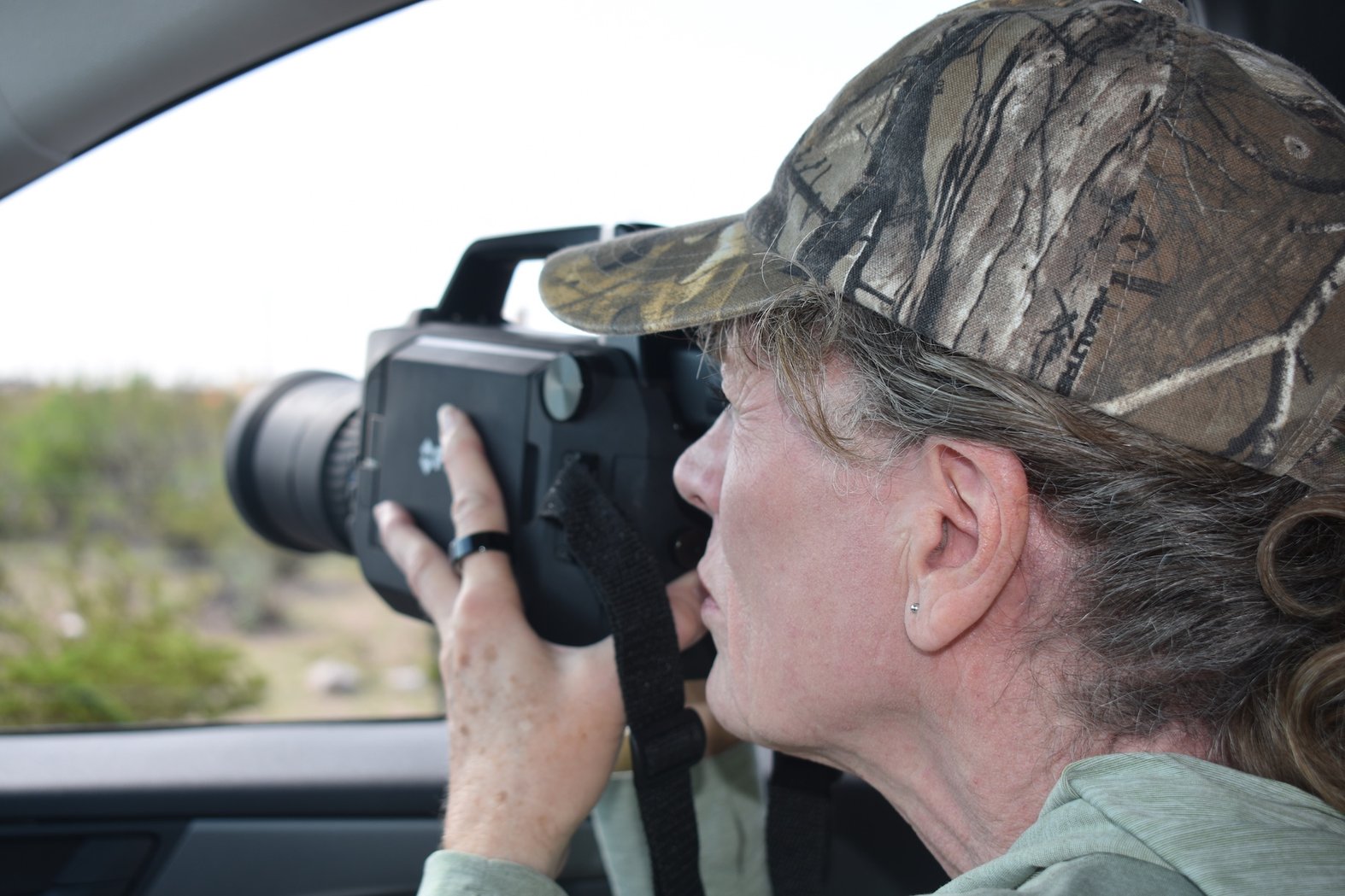 Certified thermographer Sharon Wilson with Oilfield Witness shoots a certified gas site in New Mexico. Photo by Nicholas Cunningham