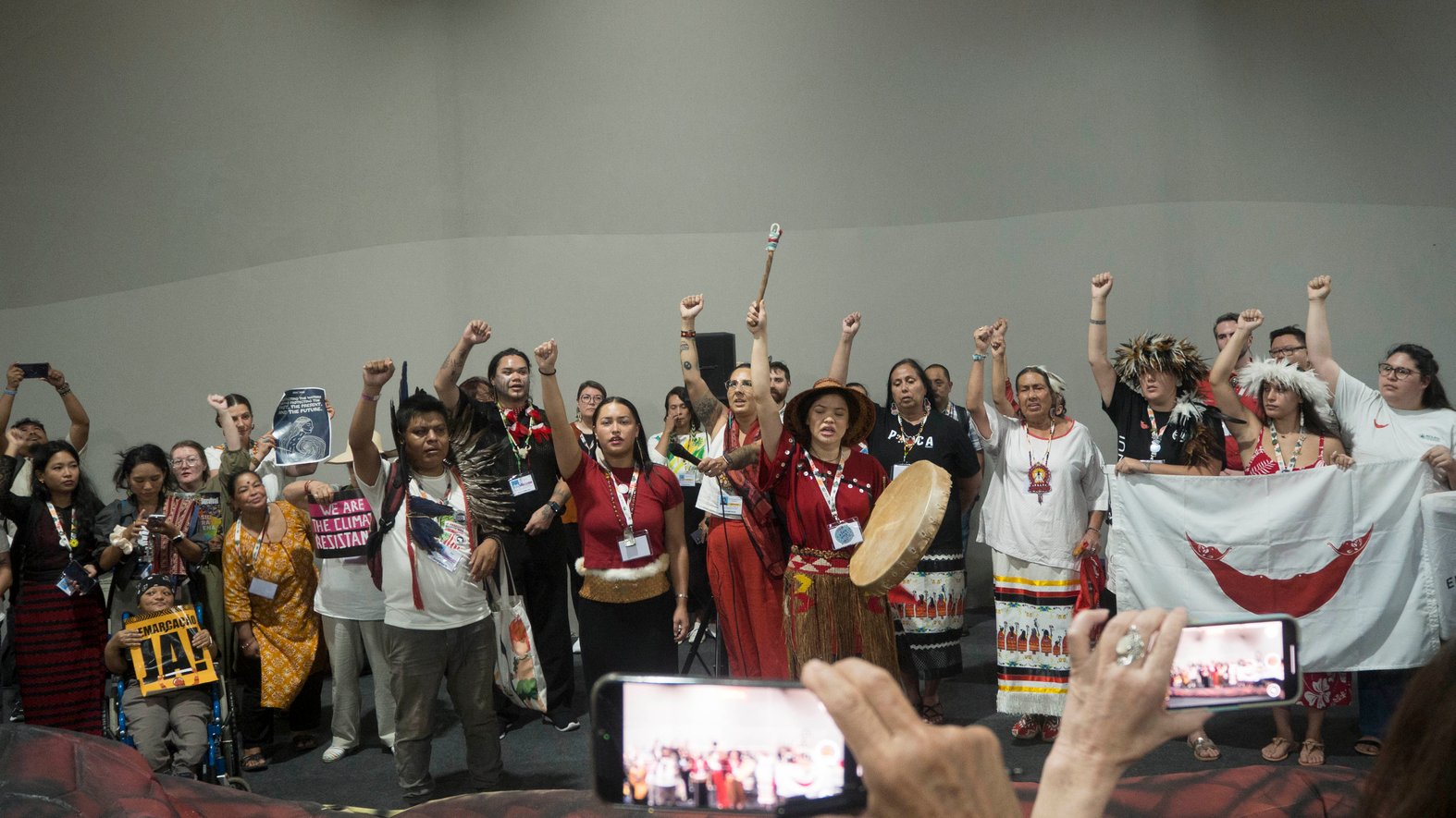 Indigenous protestors outside and inside the COP30 Blue Zone. (Top photo by Royce Kurmelovs / Bottom photo by Lindsay Crowder). 